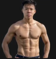 Physique portrait against a dark background